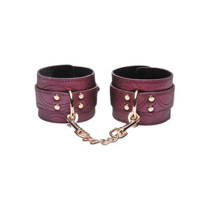 Handfesseln mit Stickereien in Violett